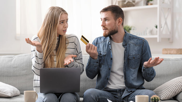 A couple struggling to pay their mortgage